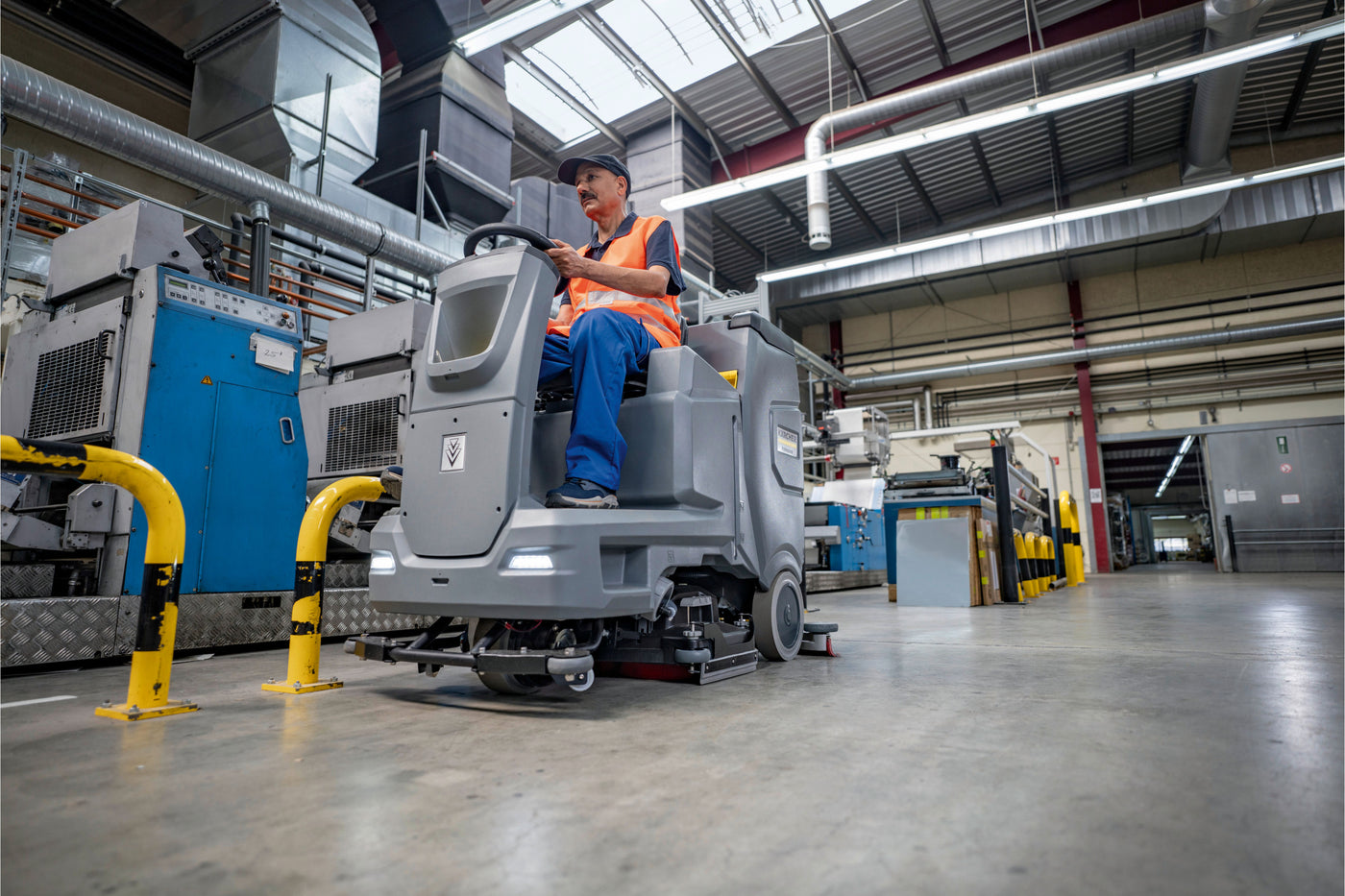 cleaning warehouse floor with Karcher floor scrubber dryer